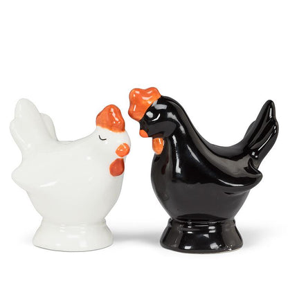 Black and white ceramic salt and pepper shakers shaped like chickens, 3 inches tall