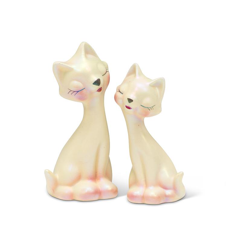 Pearl white ceramic salt and pepper shakers shaped like sleek retro cats, 4 inches tall