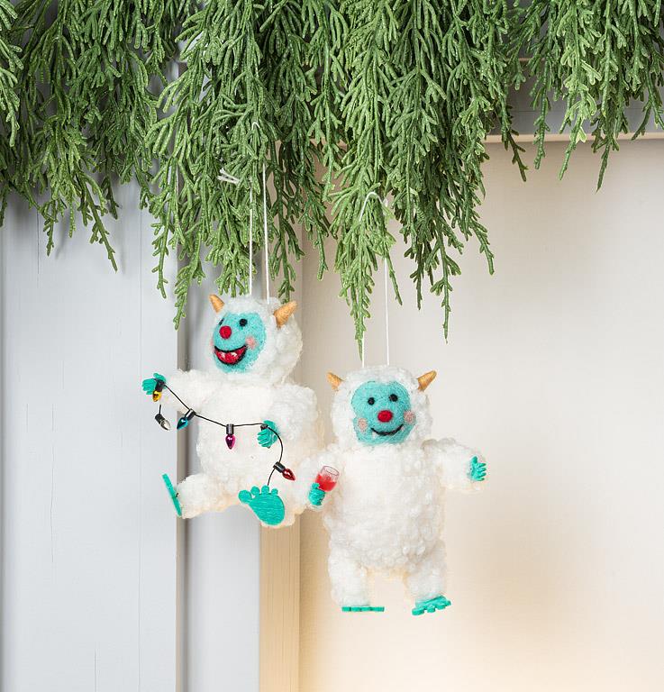 Close-up of the felted Yeti Ornament's face and wine glass detail.