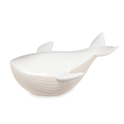 White porcelain whale figurine with matte body and glossy accents, 7 inches long