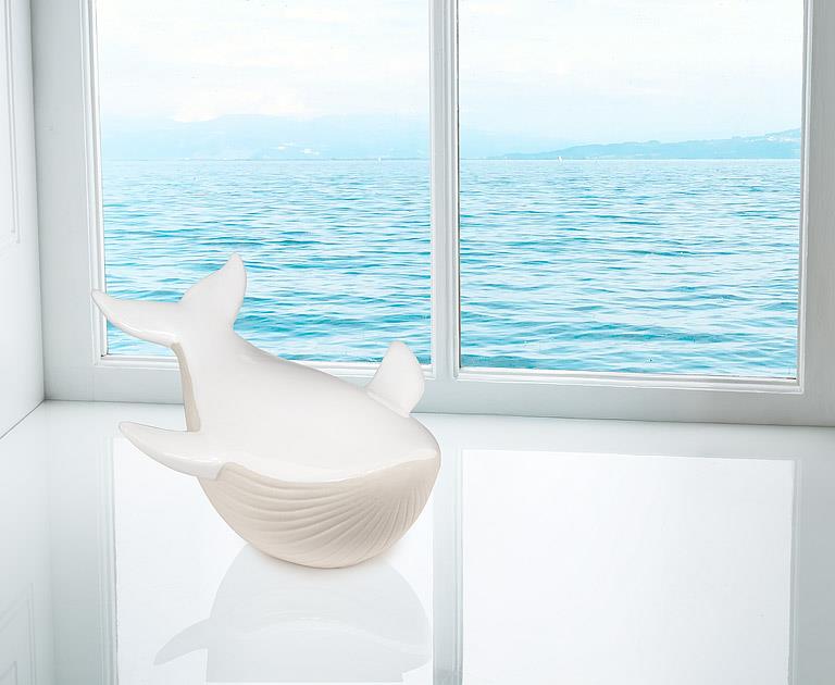 White porcelain whale figurine, additional angle