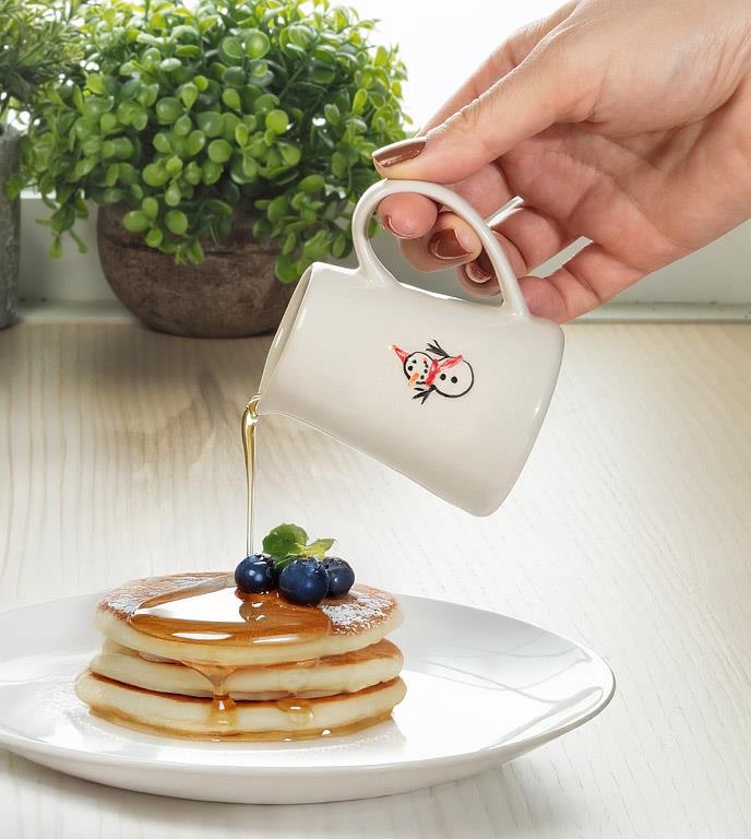 Close-up of the snowman illustration on the mini jug.