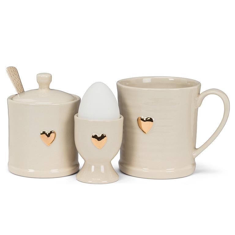 Ivory and gold stoneware heart egg cup, additional angle