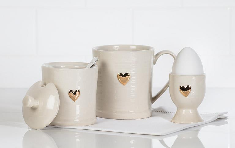Ivory and gold stoneware heart egg cup, additional angle