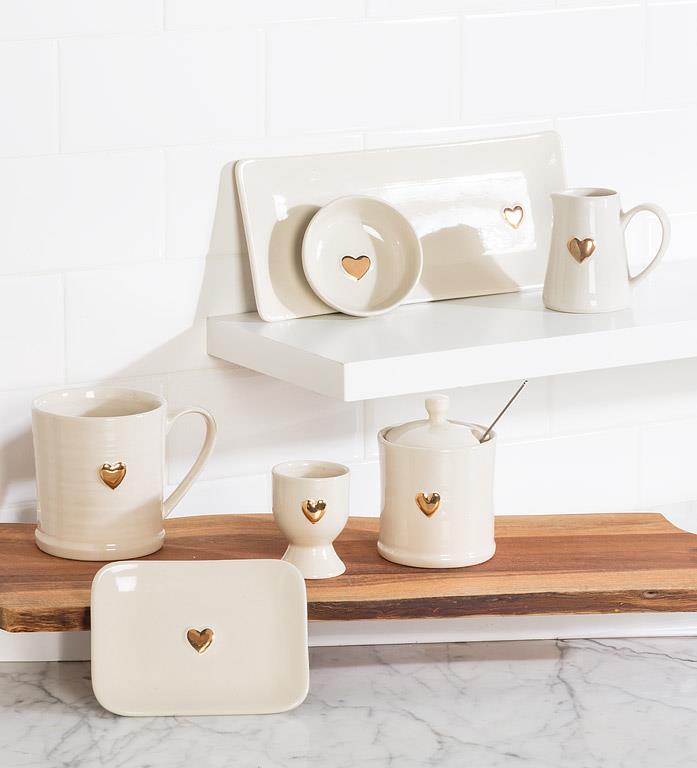 Ivory and gold stoneware heart egg cup, additional angle