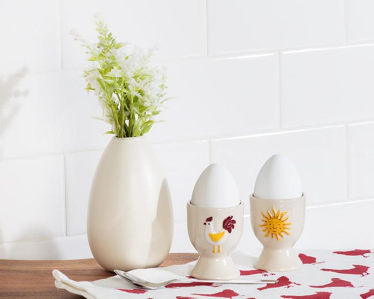 Ivory and red stoneware rooster egg cup, additional angle