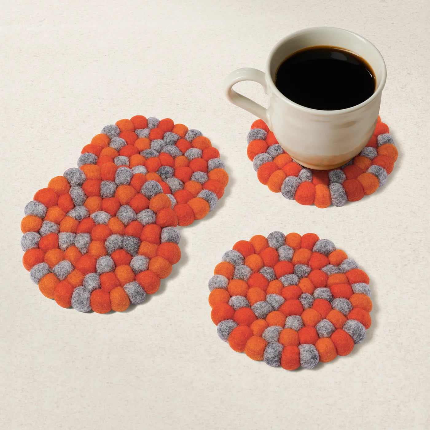 Modwool Felt Ball Coasters Orange + Grey