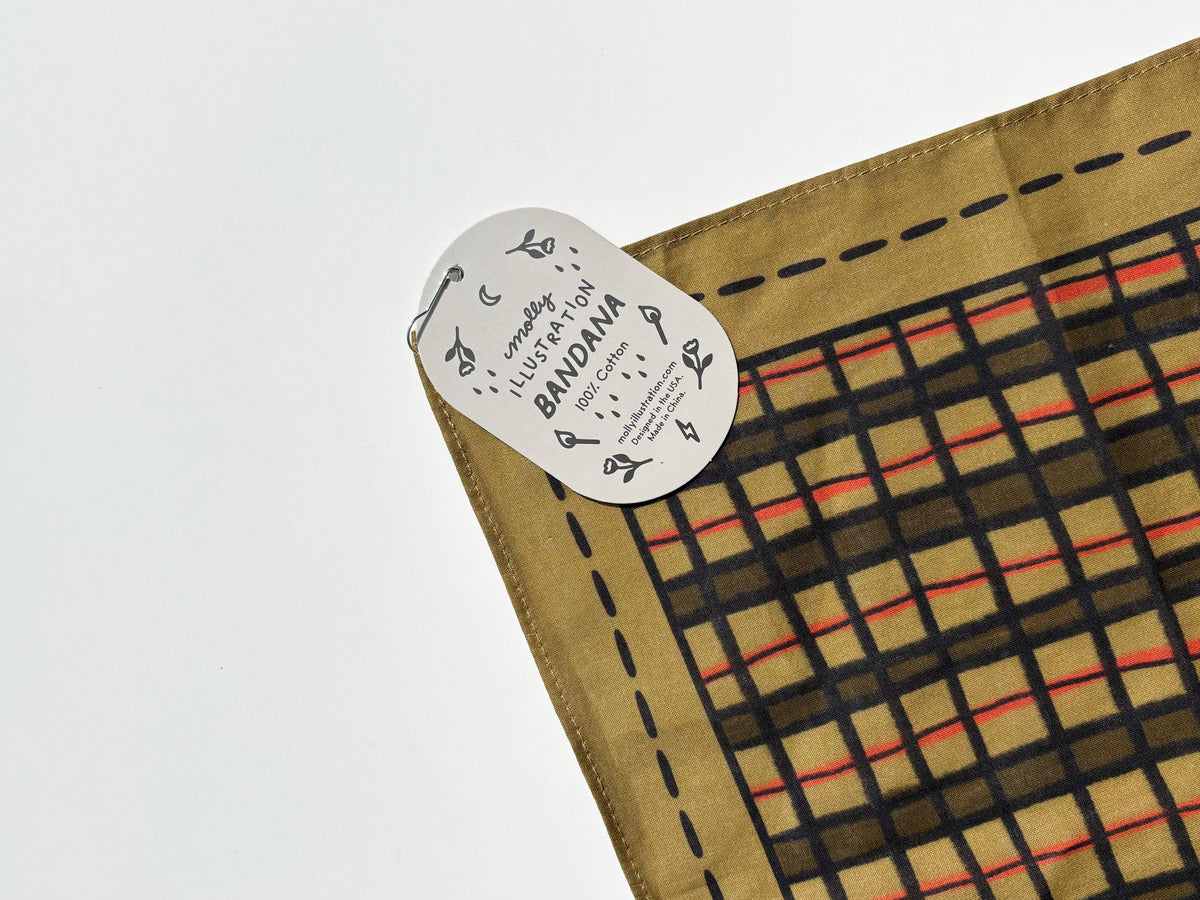 The Wonky Plaid bandana shown fully unfolded to display the full print