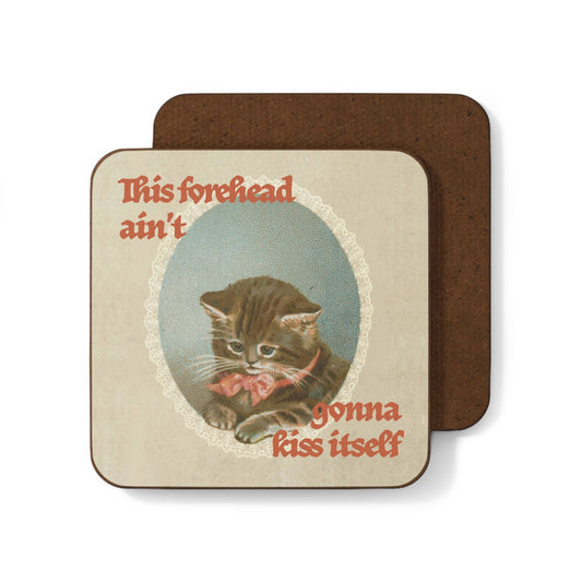 Vintage-style coaster with an oval photo of a grey tabby kitten wearing a pink bow, text reads "This forehead ain't gonna kiss itself"