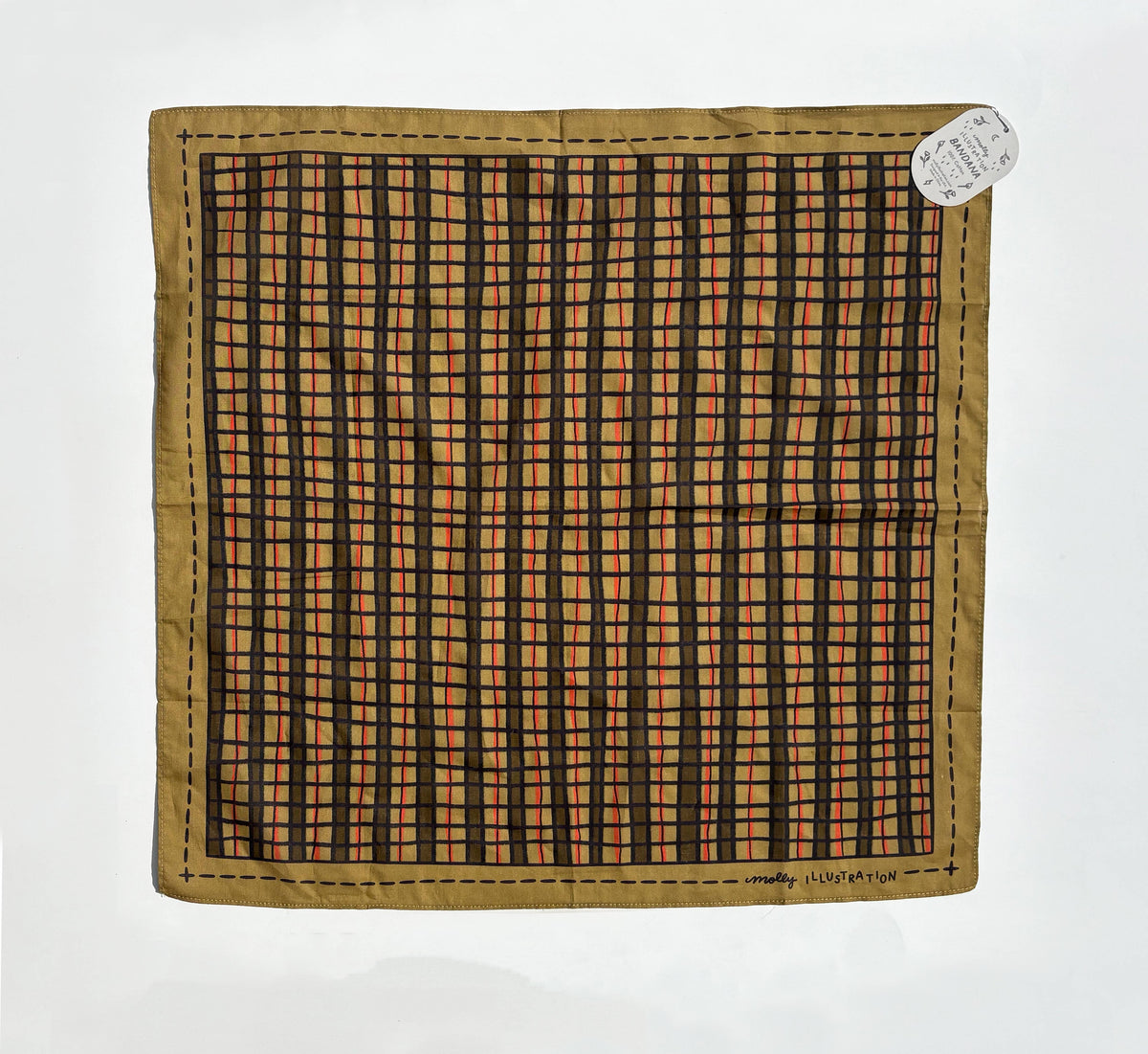 Close-up of the wonky plaid pattern on the cotton bandana fabric