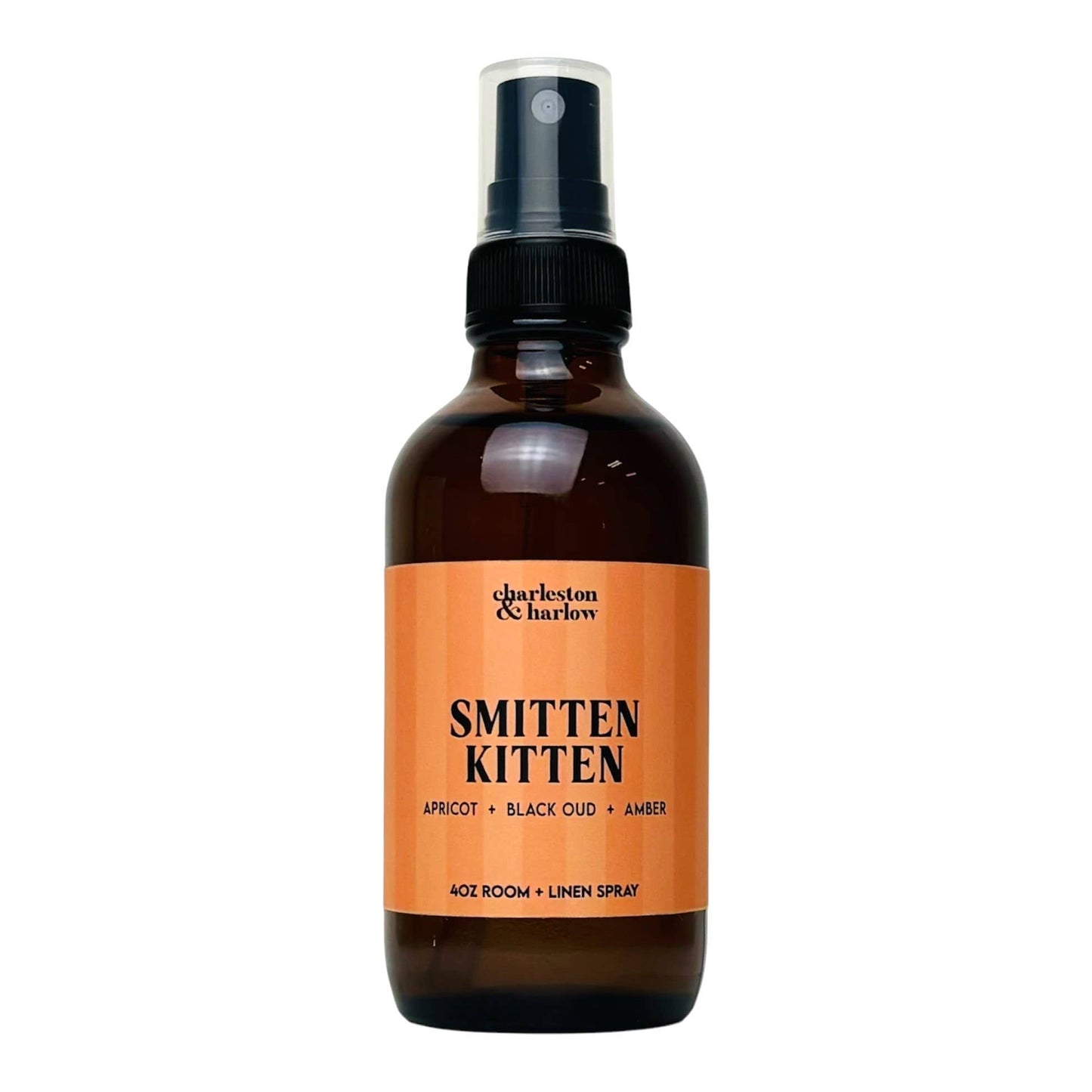 Amber glass spray bottle of Charleston & Harlow Smitten Kitten room and linen spray with peach striped label
