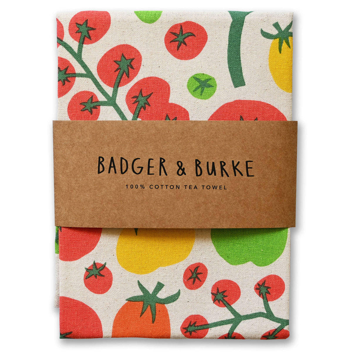 Folded natural cotton tea towel printed with red vine tomatoes and yellow and green heirlooms, Badger + Burke kraft band - PABOOM