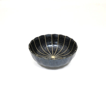 Black Japanese sauce dish styled with food - PABOOM