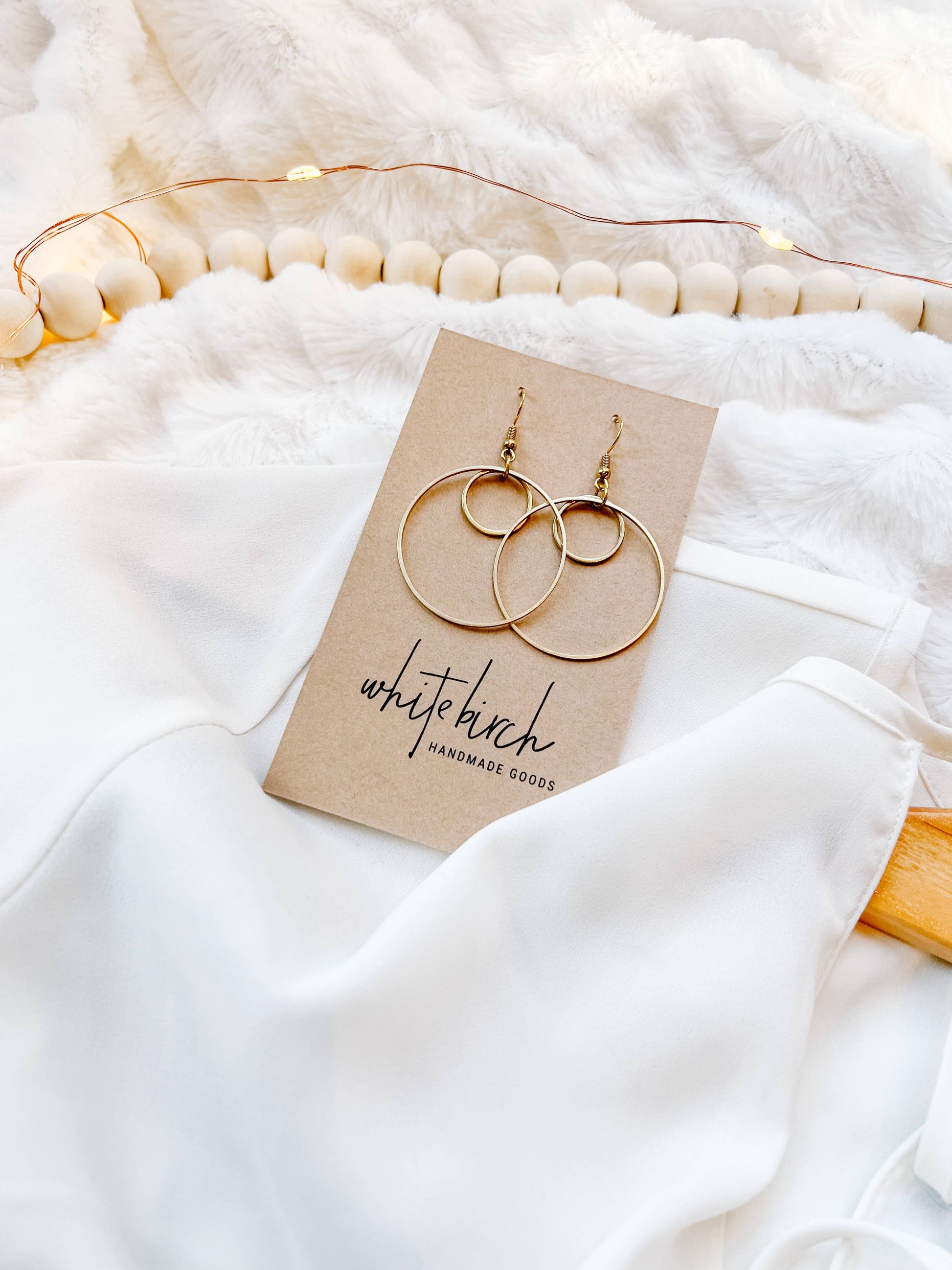 Brass double circle earrings close-up on earring card