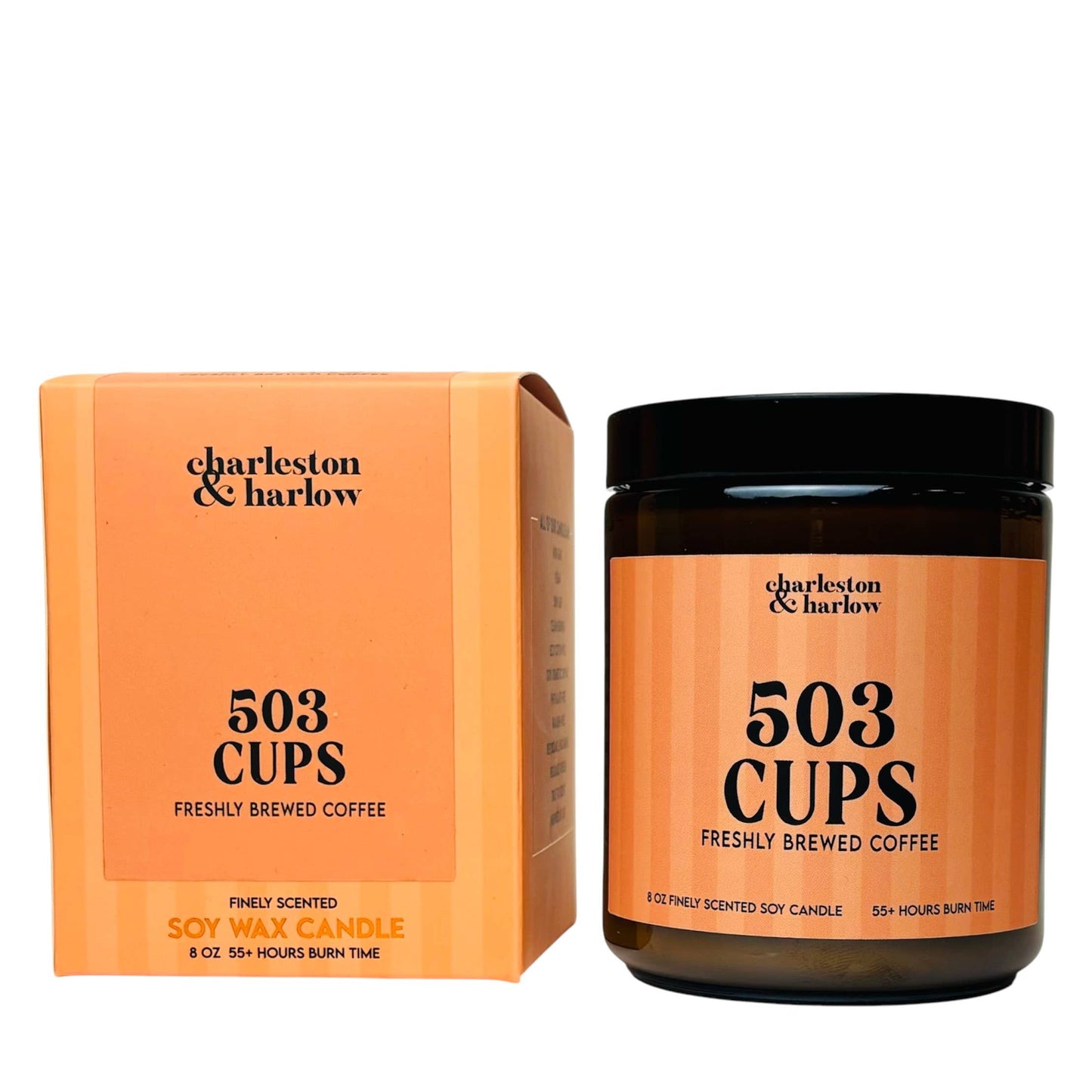 Charleston & Harlow 503 Cups soy candle in amber glass jar with orange striped label, next to its matching gift box