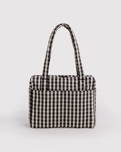 BAGGU Small Cloud Carry-On in black and cream gingham, shown from the front with top handles