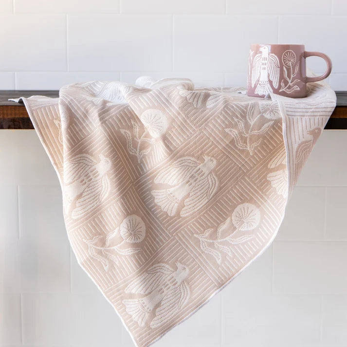 Peregrine dishtowel folded to show the mirrored reverse layer – PABOOM