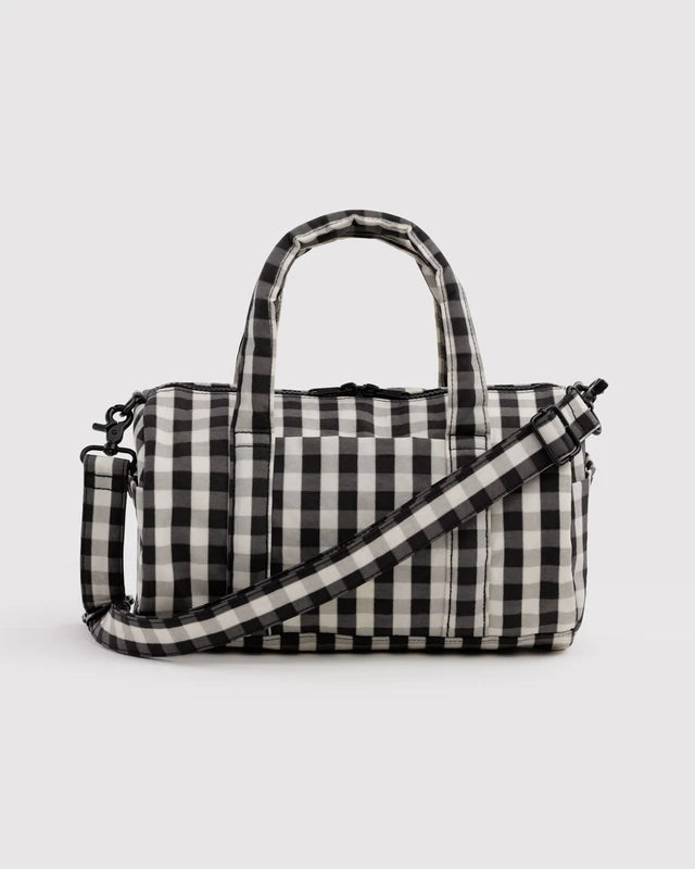 BAGGU Nylon Duffle Bag in Black and Cream Gingham with padded top handles and crossbody strap - PABOOM