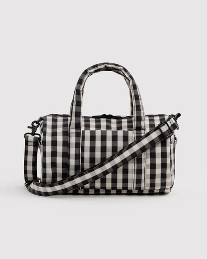 BAGGU Nylon Duffle Bag in Black and Cream Gingham with padded top handles and crossbody strap - PABOOM
