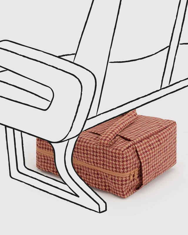 Close-up of the tech pocket and side pockets on the BAGGU Small Cloud Carry-On in tan houndstooth