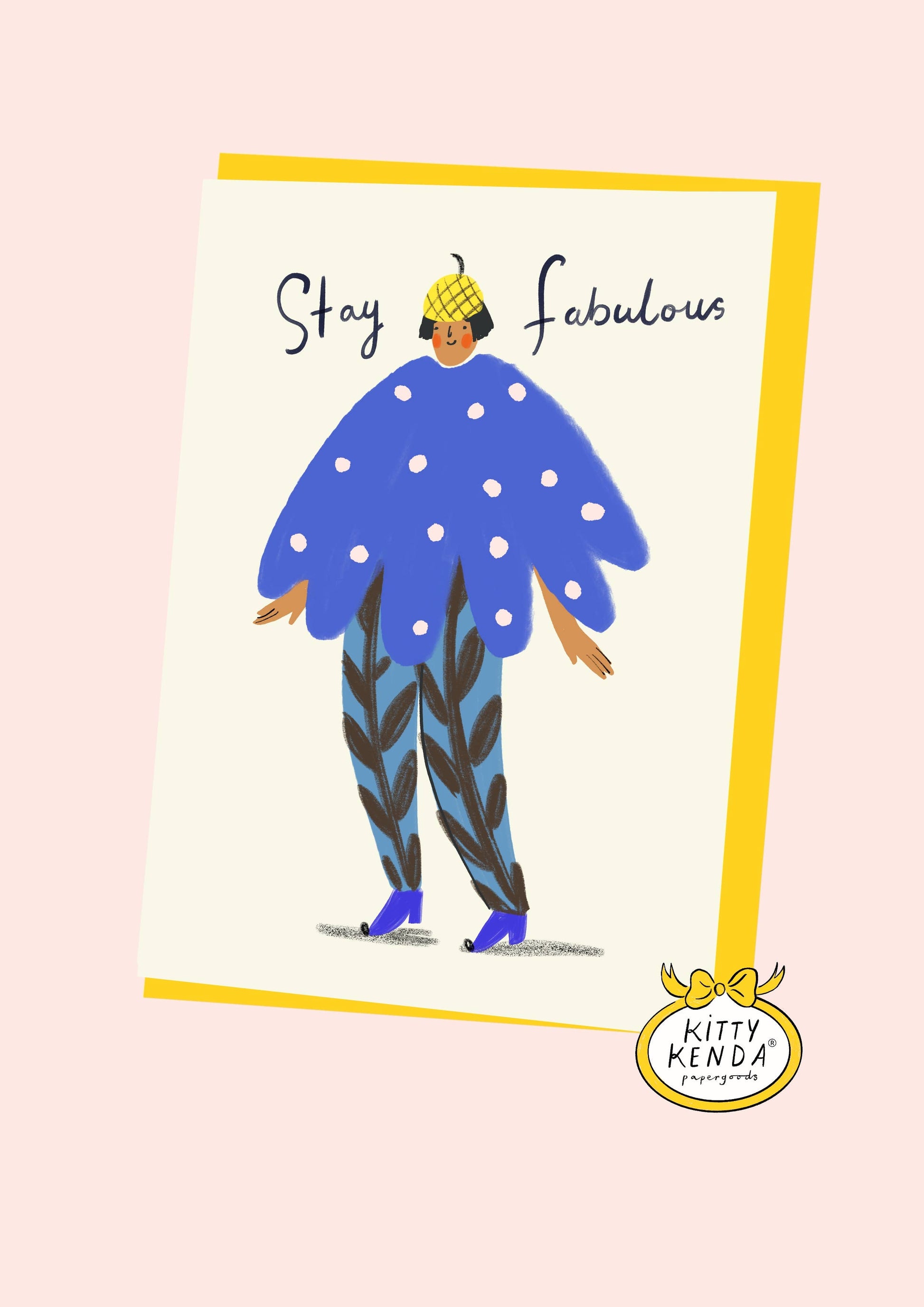 Kitty Kenda greeting card illustrating a figure in a polka-dot cape and patterned hat with "Stay Fabulous" text