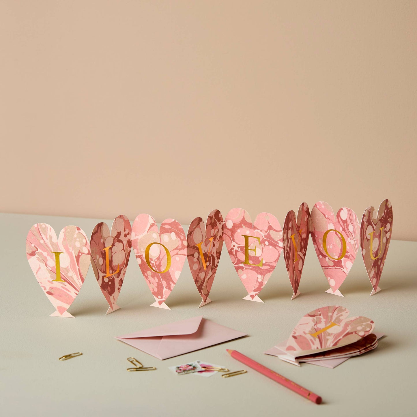 Heart Concertina I Love You card partially folded showing individual hearts
