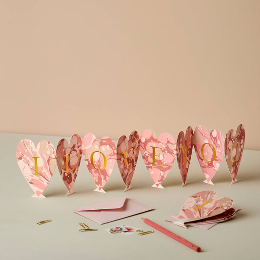 Heart Concertina I Love You card partially folded showing individual hearts