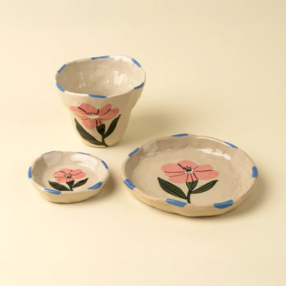 Flora Pottery Mini Dish in Rose shown at an angle