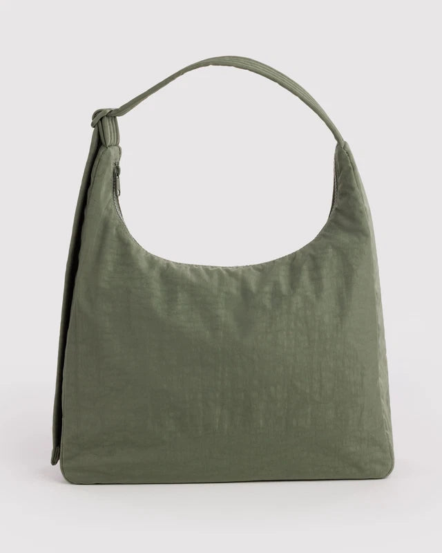 BAGGU Nylon Shoulder Bag in caper green, shown from the front with its curved top handle