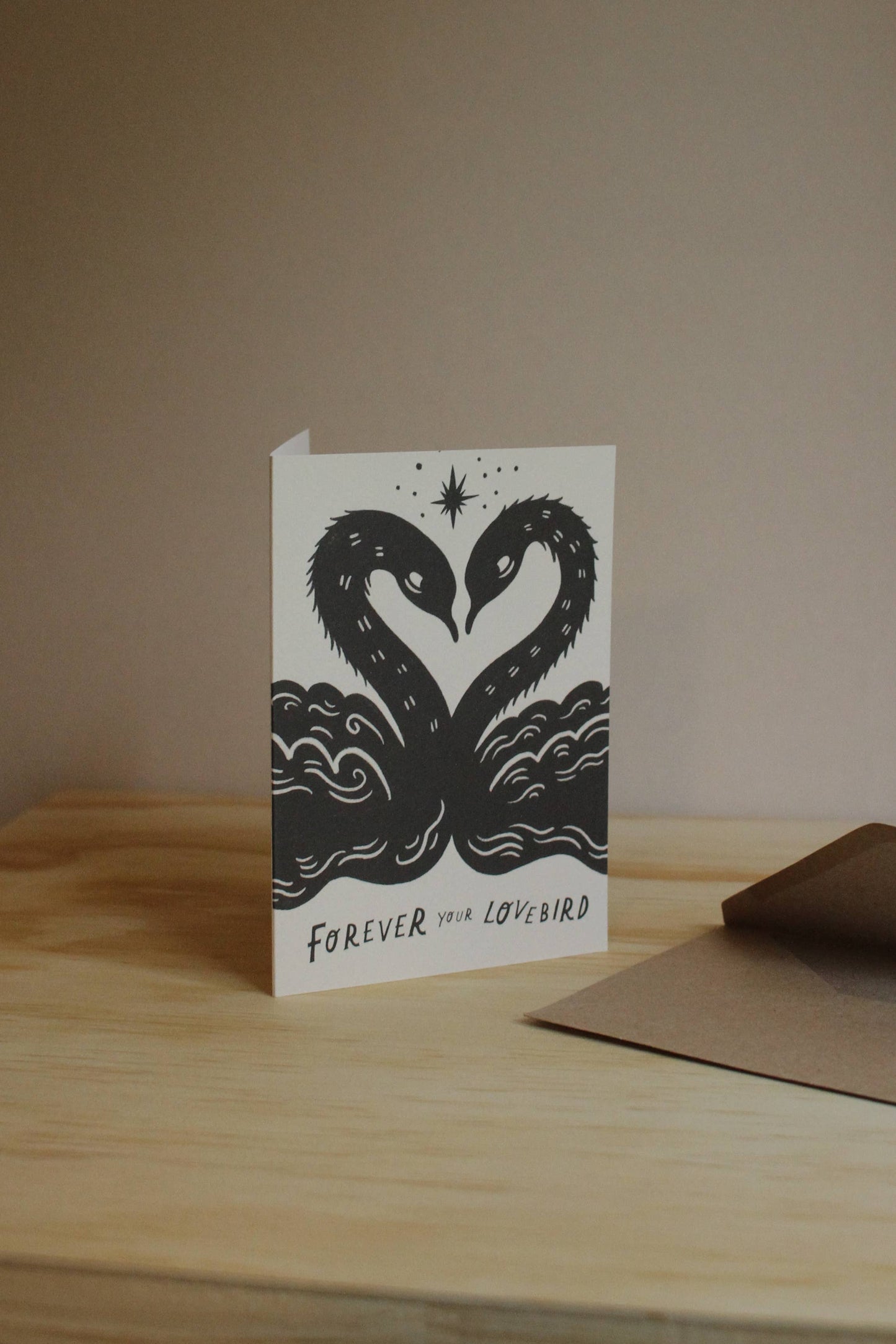 Close-up of the swan illustration detail on the 'Lovebirds' card