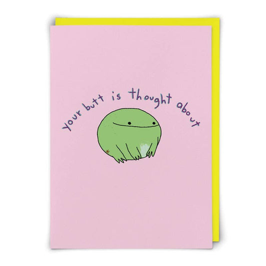 Pink card with a round green frog and hand-lettered text 'your butt is thought about' - PABOOM