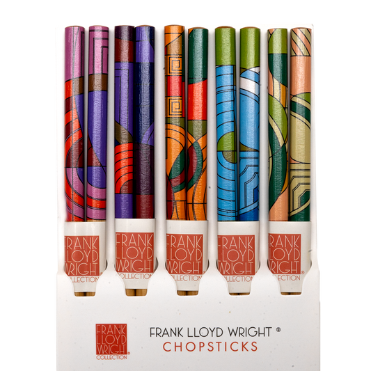 Five pairs of Frank Lloyd Wright Max Hoffman-pattern bamboo chopsticks in pink, purple, orange, blue, and green Art Deco designs, displayed upright in packaging