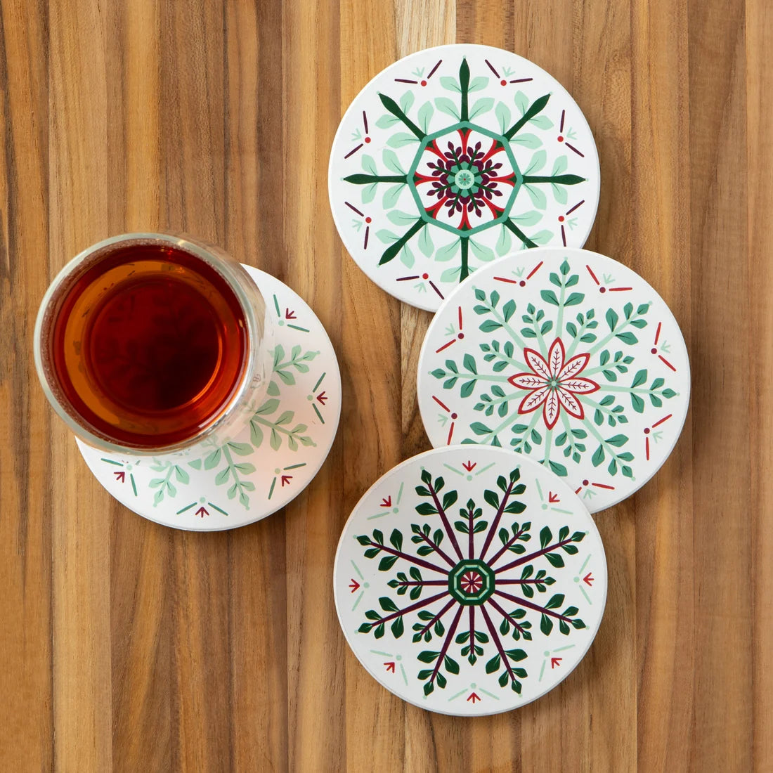 Good Tidings coaster shown from the side, displaying the cork backing - PABOOM