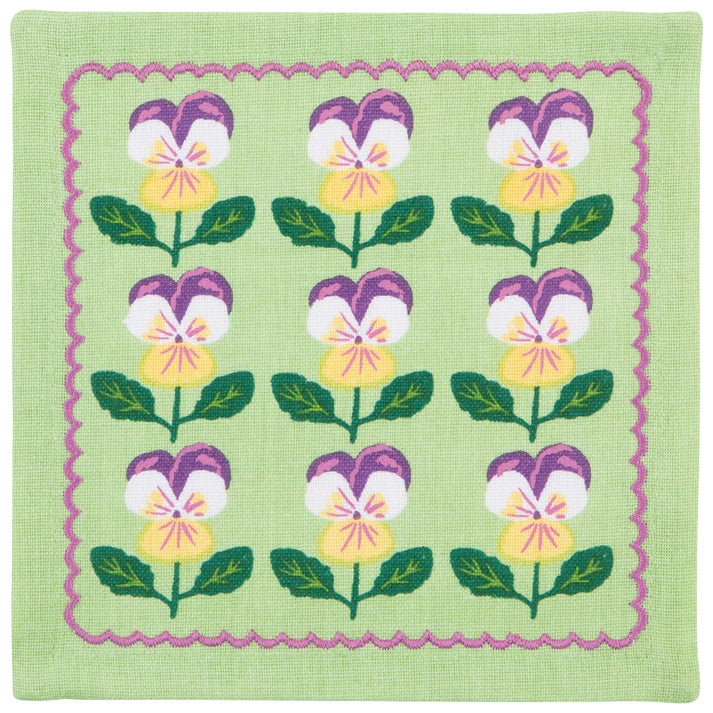 Close-up of the pansy print on one cocktail napkin – PABOOM