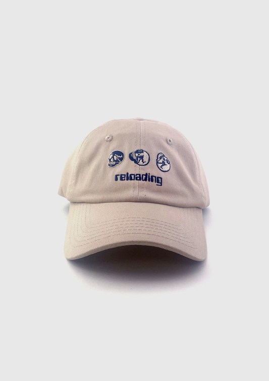 Tan dad hat embroidered with three small skulls and the word reloading - PABOOM