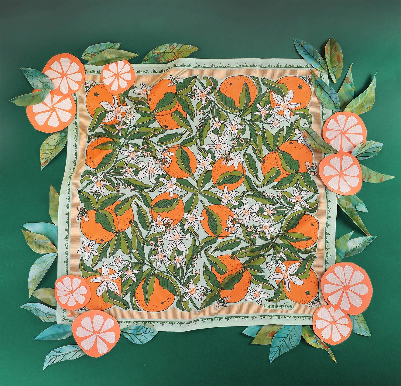 Close-up of the Zoe Bandana's hand-painted floral and leaf detail