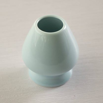 Matcha whisk stand in a tea ceremony setting - PABOOM