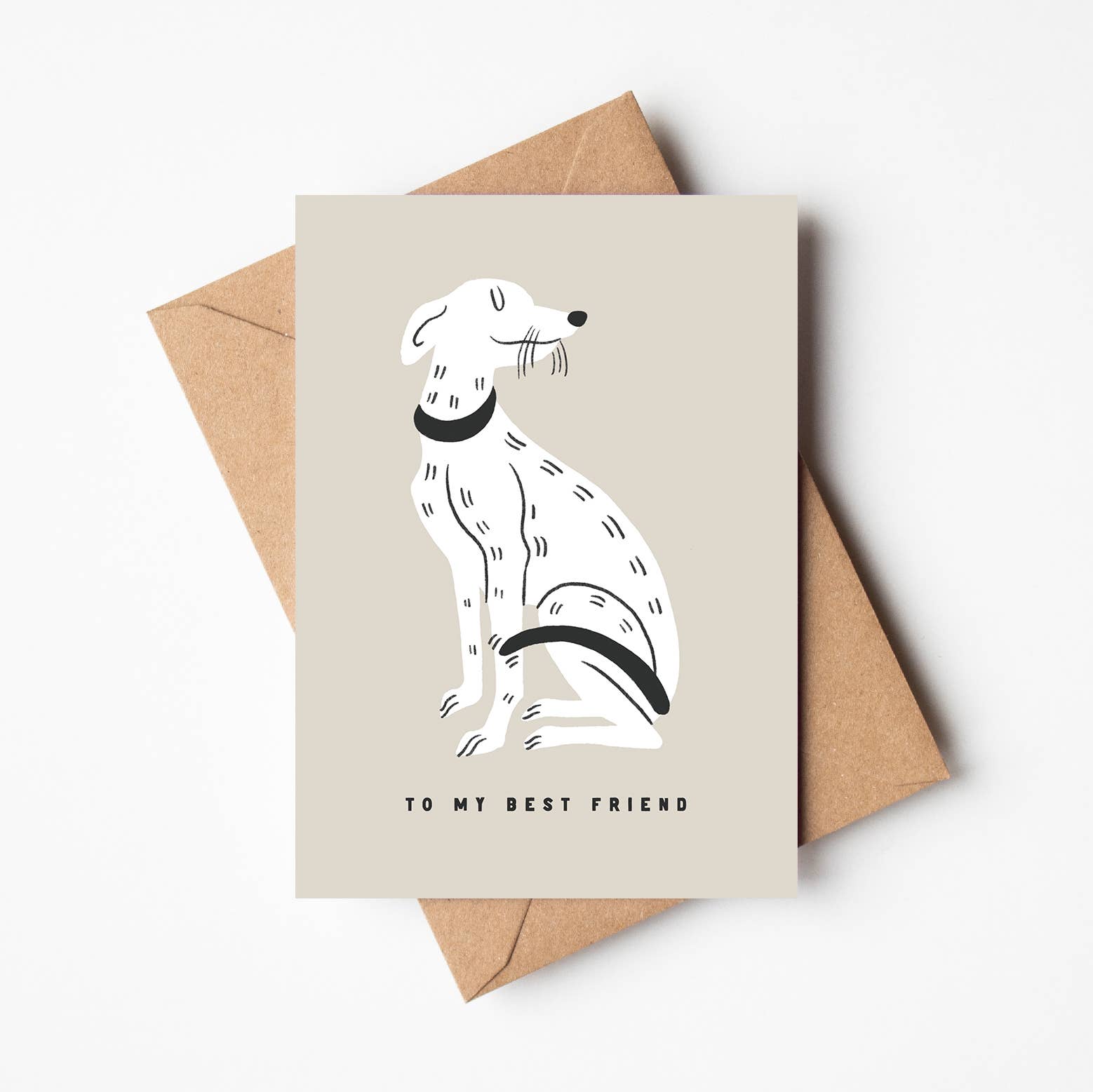 'To My Best Friend' friendship card featuring a cream illustrated greyhound with a black collar, sitting above the words 'TO MY BEST FRIEND'