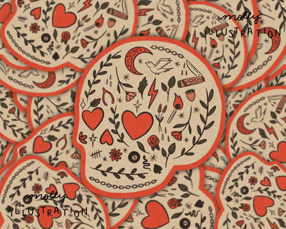 Waterproof vinyl sticker pattern of skulls with heart eyes surrounded by botanical hearts and leaves in red, black and green on a cream background