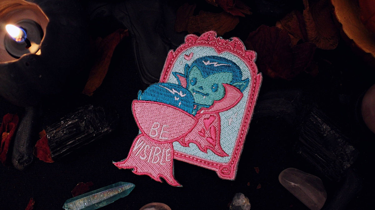 Be Visible Trans Patch shown on its backing card for scale