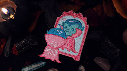 Be Visible Trans Patch shown on its backing card for scale