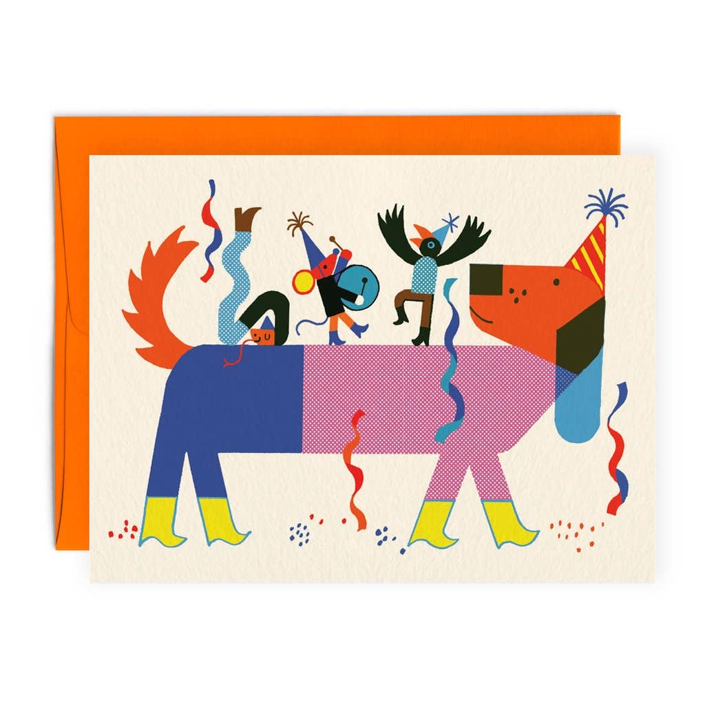 Two-toned illustrated dog in a party hat carrying three tiny costumed performers on its back, amid confetti and streamers
