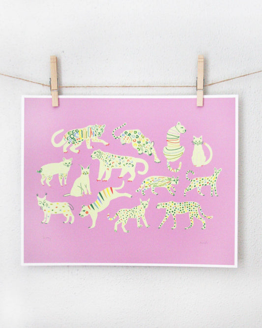 Art print of cream-coloured wild cats with rainbow spot patterns on a pink background, clipped to a string — PABOOM
