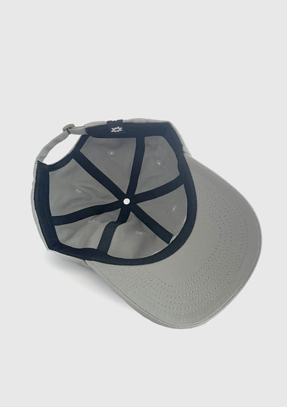 Angled view of Triple Threat dad hat brim - PABOOM
