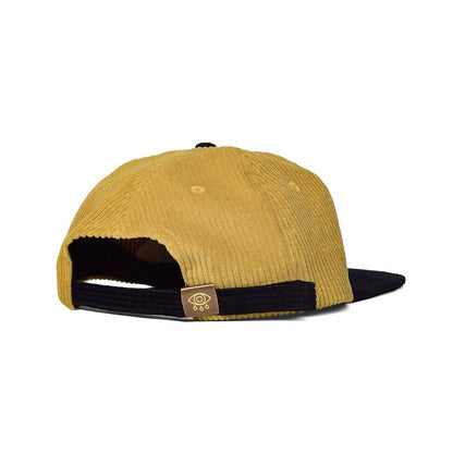 Side view of the Eye See You corduroy dad hat showing the adjustable brass clasp engraved with a crying eye - PABOOM