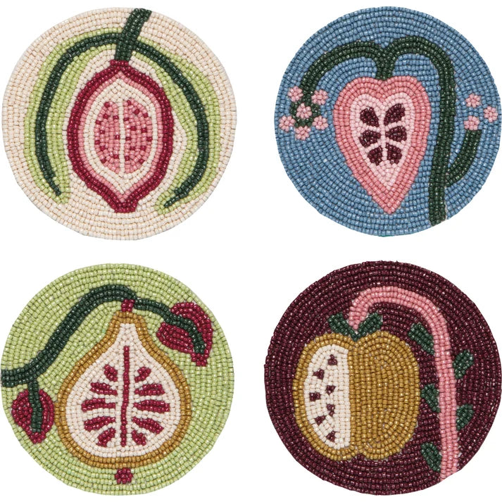 Four round hand-beaded coasters with botanical fruit and vine designs in pink, blue, green, and burgundy – PABOOM