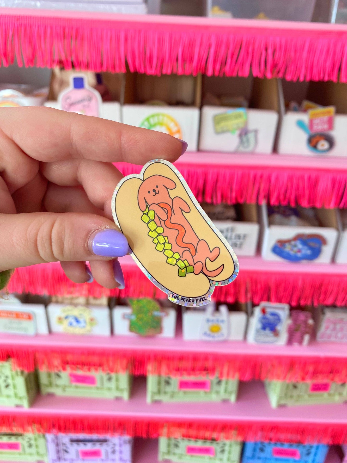 Close-up detail of the sticker's glitter finish