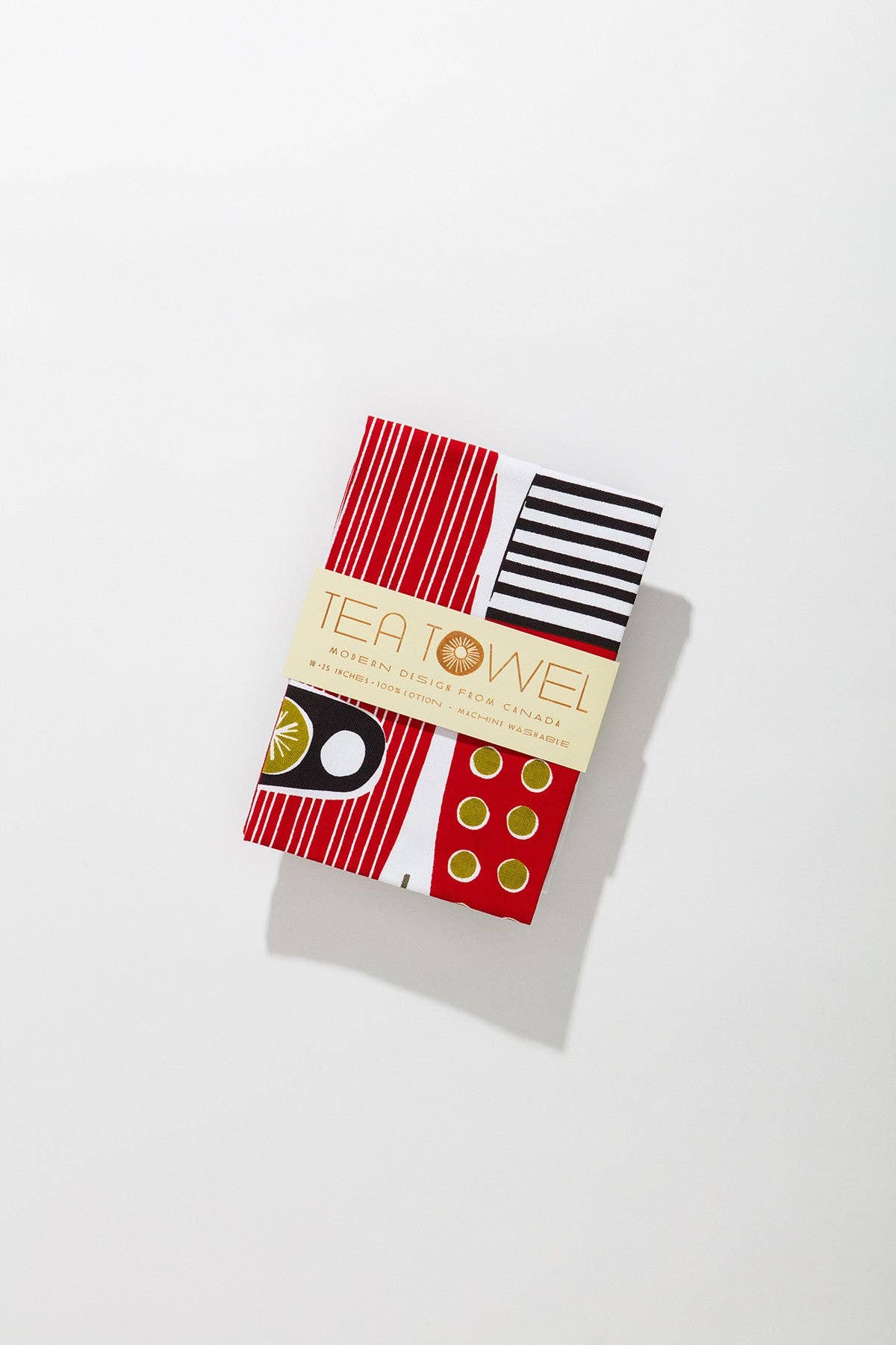 Canoes tea towel folded and displayed in kitchen setting - PABOOM