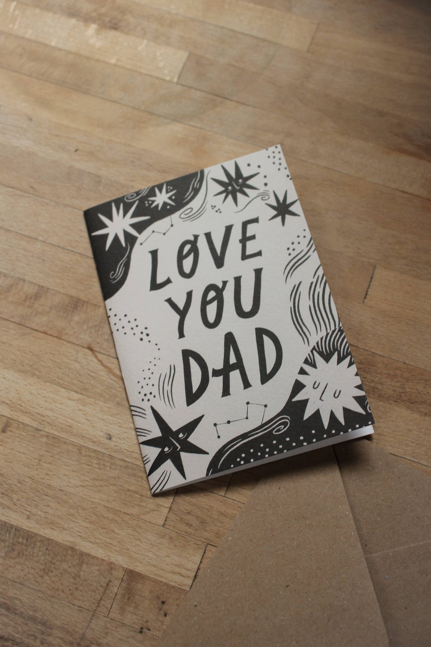 Close-up of the star and constellation illustration on 'Love You Dad' card