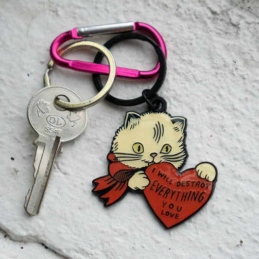 Destroy Cat Keychain shown from a different angle with hanging tag
